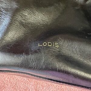 Lodi’s black purse/backpack